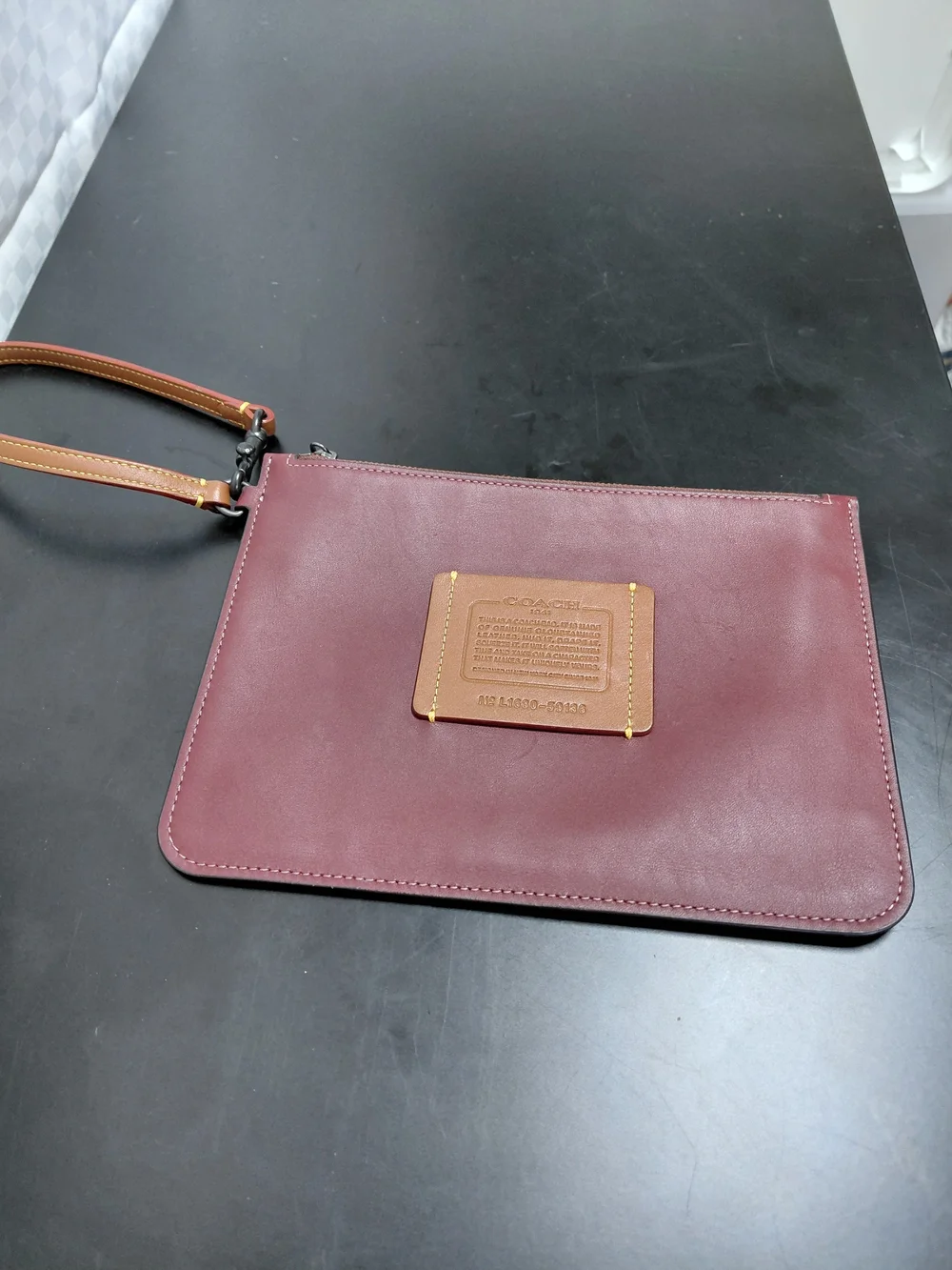 Coach Burgundy Leather Wristlet with Tan Patch